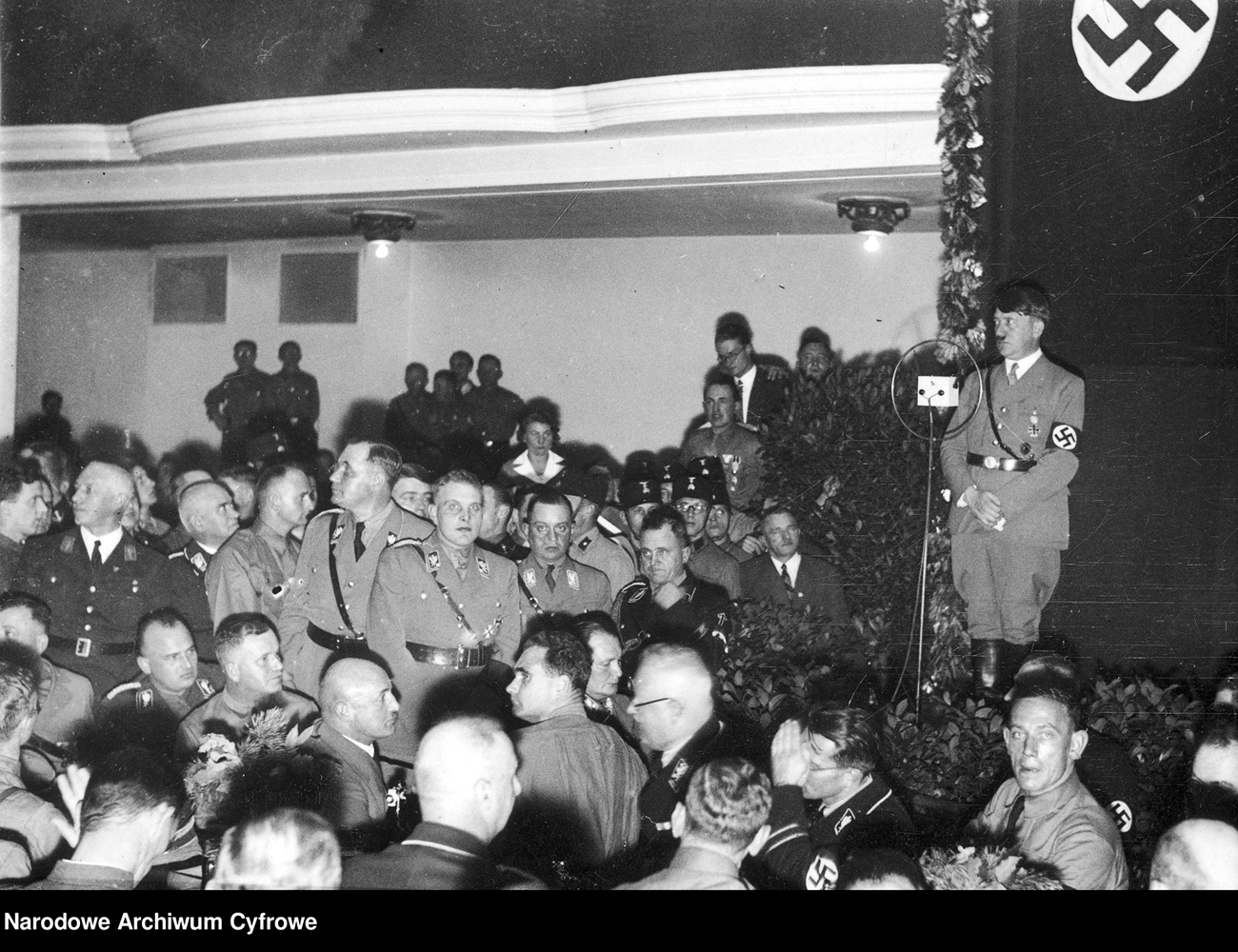 Adolf Hitler makes a speech to party members in Munich's Bürgerbräukeller for the 10th anniversary of the putsch attempt